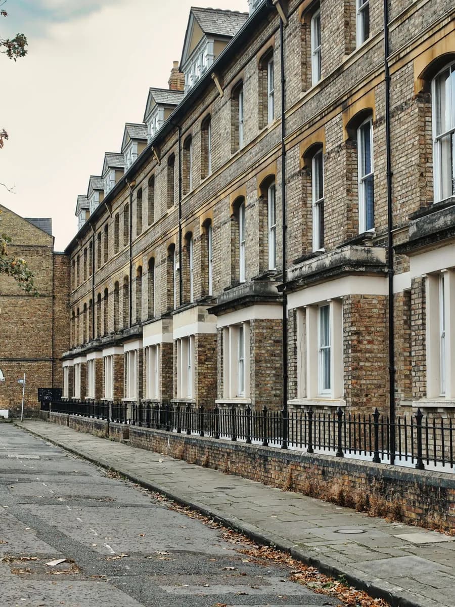 A row of brick terraced homes in England