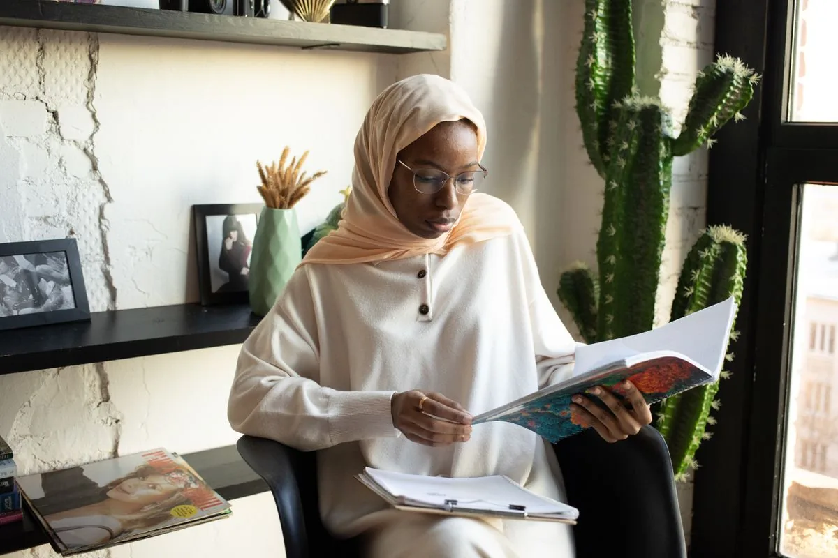 A woman reading in a home interior
