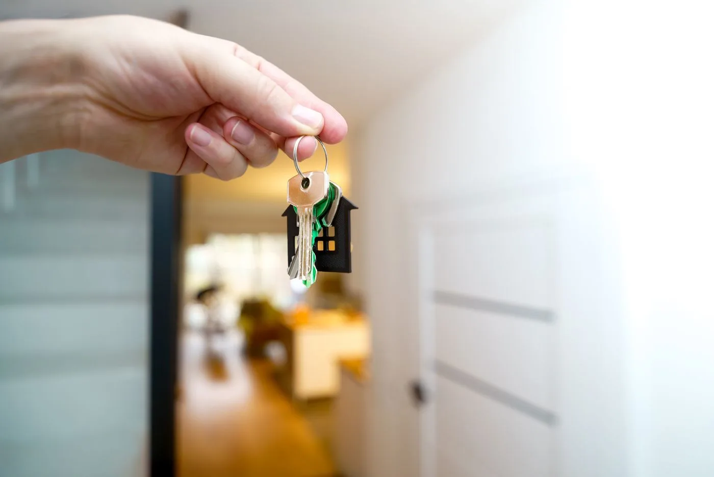 House keys held inside an apartment